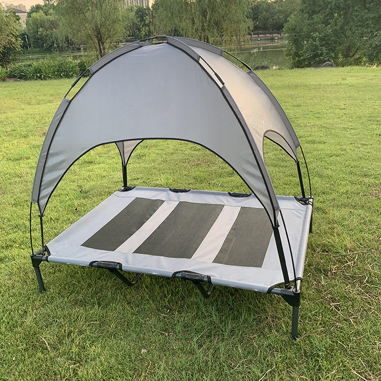 Grey Shade Cot with canopy on grass