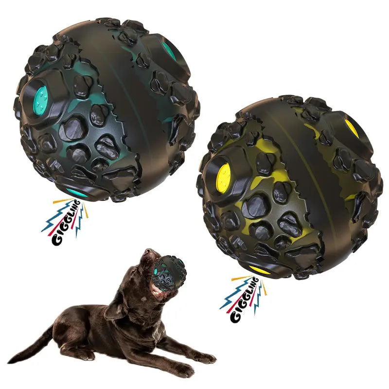 Two Giggle Ball colors with a dog for scale