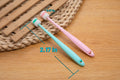 Pink and teal Toothbrush, 0.67 in head
