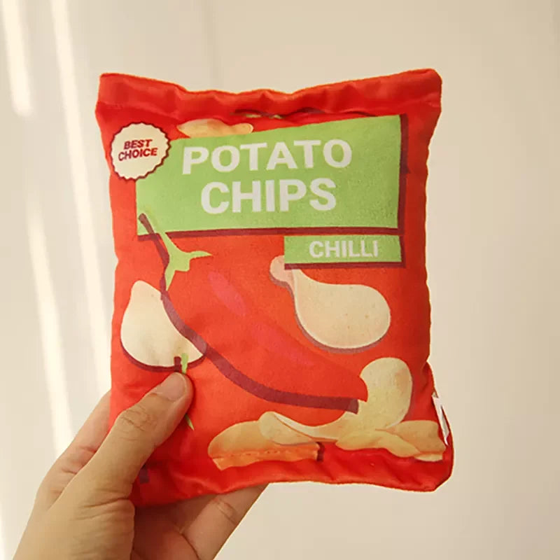 Red Chip Bag held in a hand