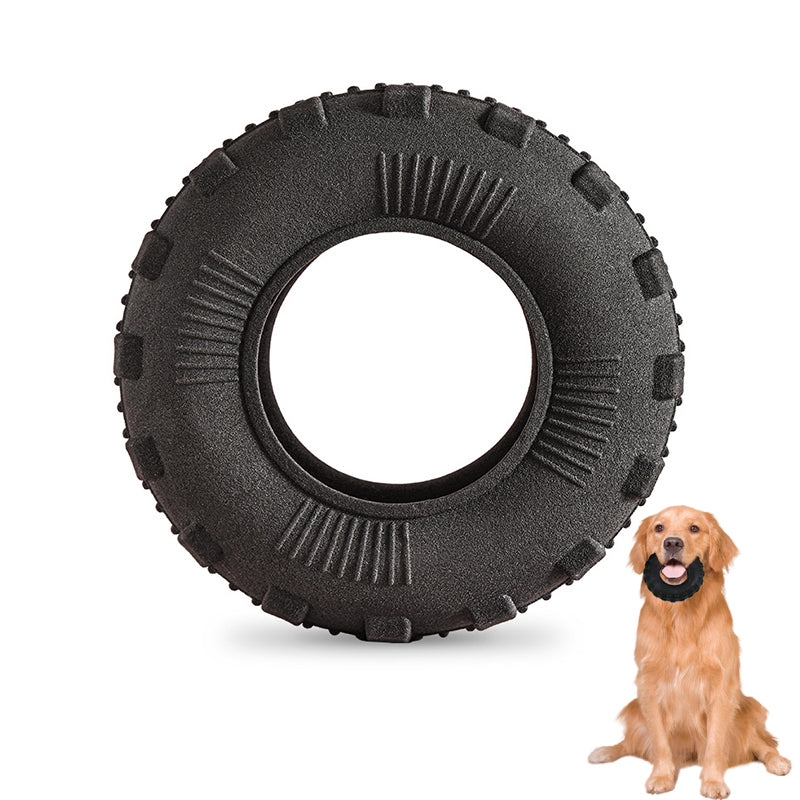Black Tyre Chew on white with a Golden for scale
