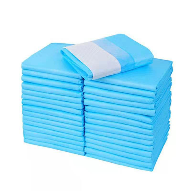 Two Pee Pad stacks with one pad unfolded