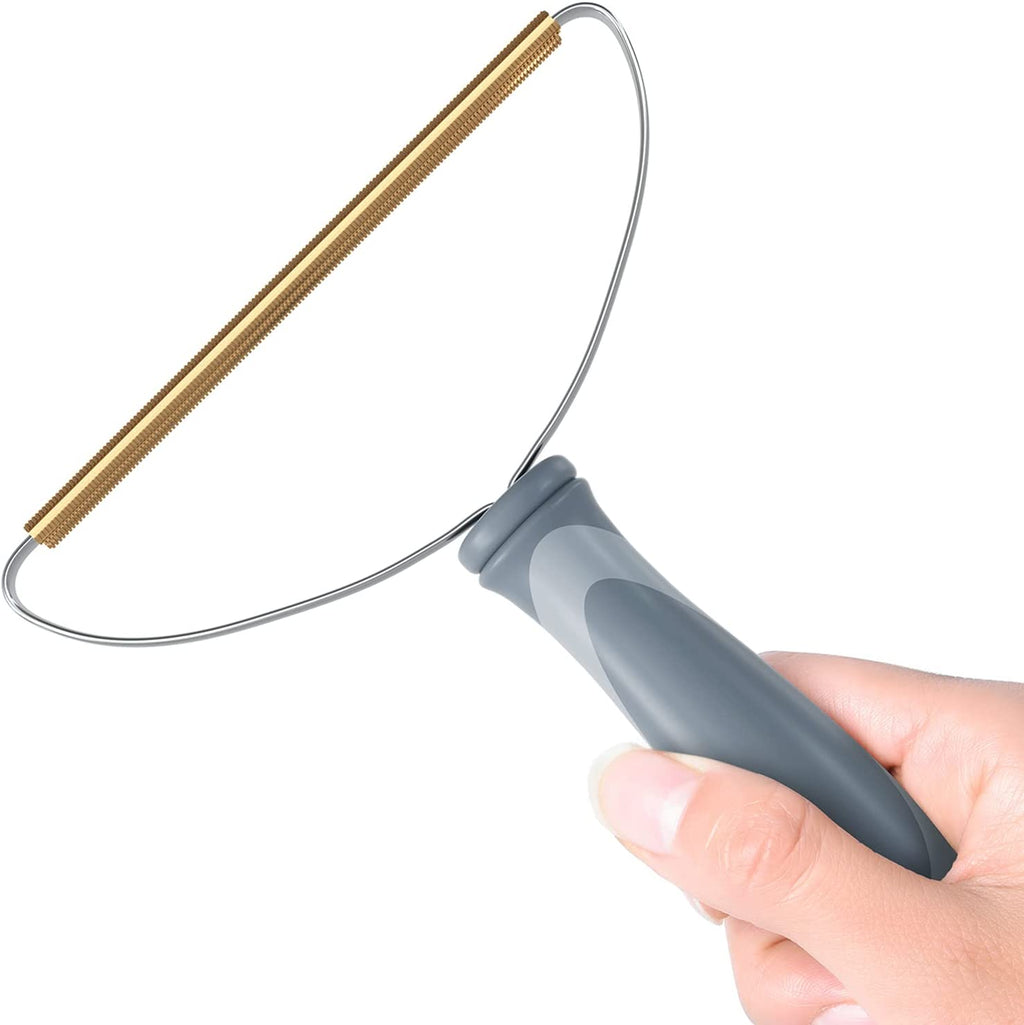 Hair Scraper held, copper edge