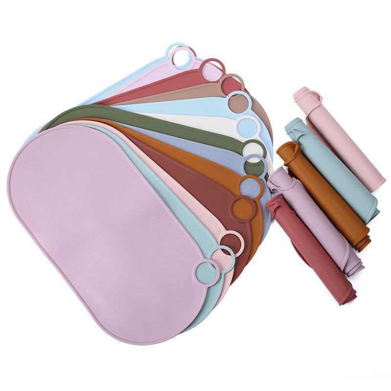 OrvelloGo mealtime mats in multiple colors, flat and rolled