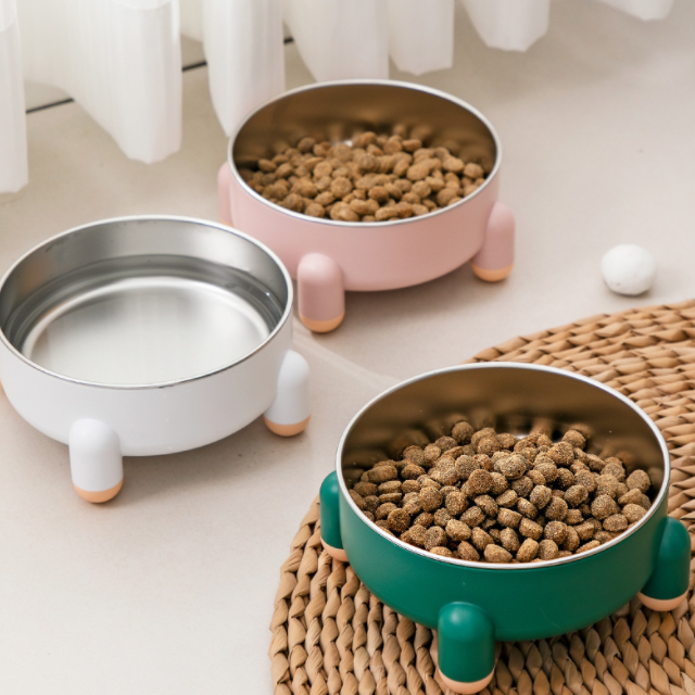 Three Raised Bowls on a floor