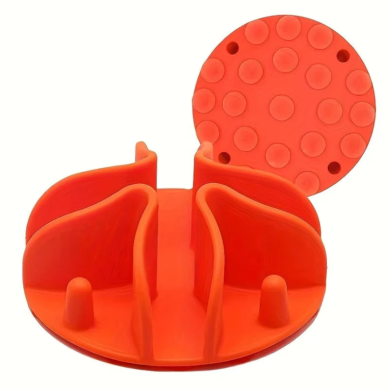 Orange slow-feed insert showing feeding ridges and suction-cup base